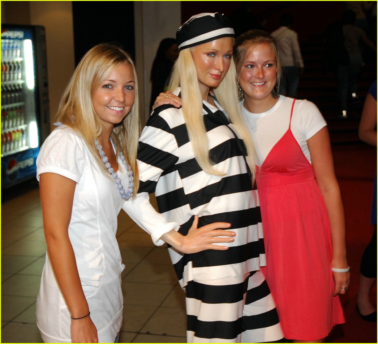 Paris Hilton: Red Carpet Ready to Striped Prison Chic
