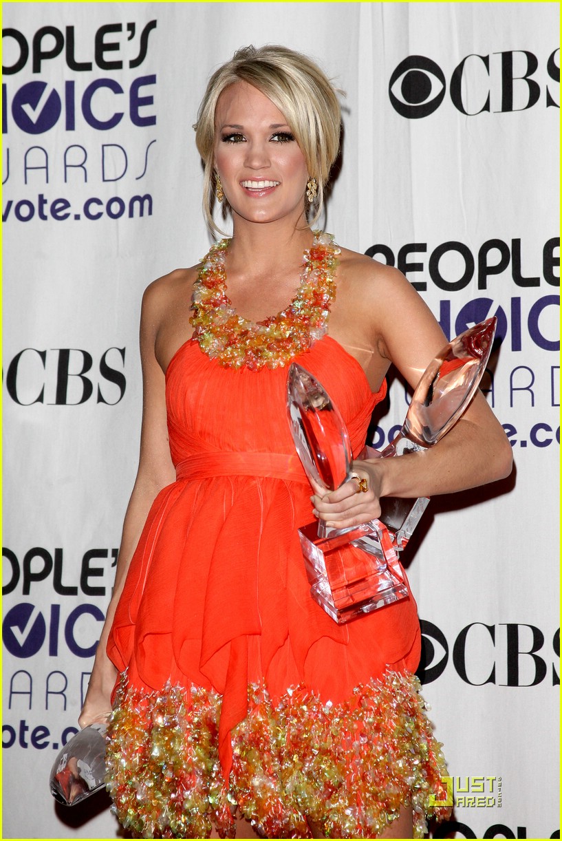 carrie underwood orange dress Carrie Underwood's 'American Idol' Finale Dress Hits the Road