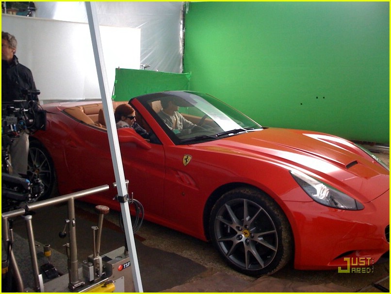 Ashton Kutcher Fires Up The Ferrari