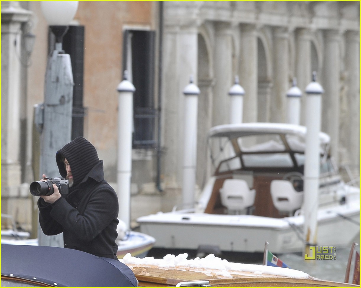 Brad Pitt Takes Snapshots in the Snow