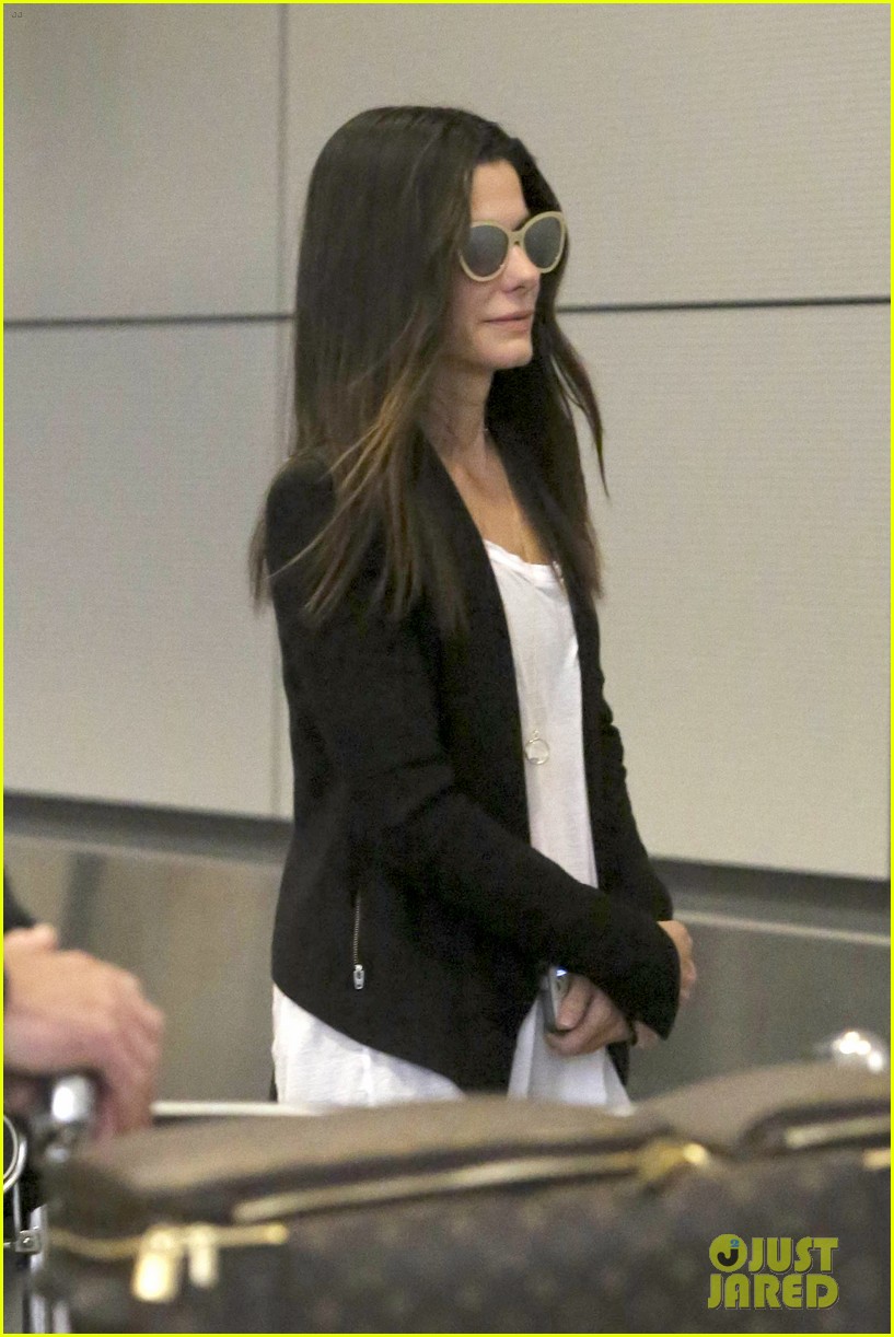 Sandra Bullock & Louis Land at LAX After Australia Trip
