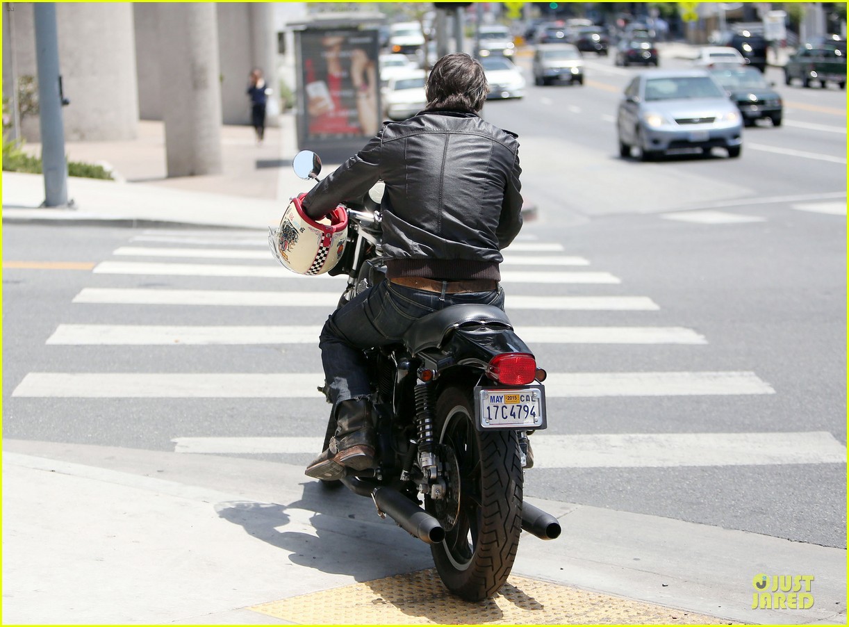Olivier Martinez Carries His Motorcycle Helmet Like a Purse!