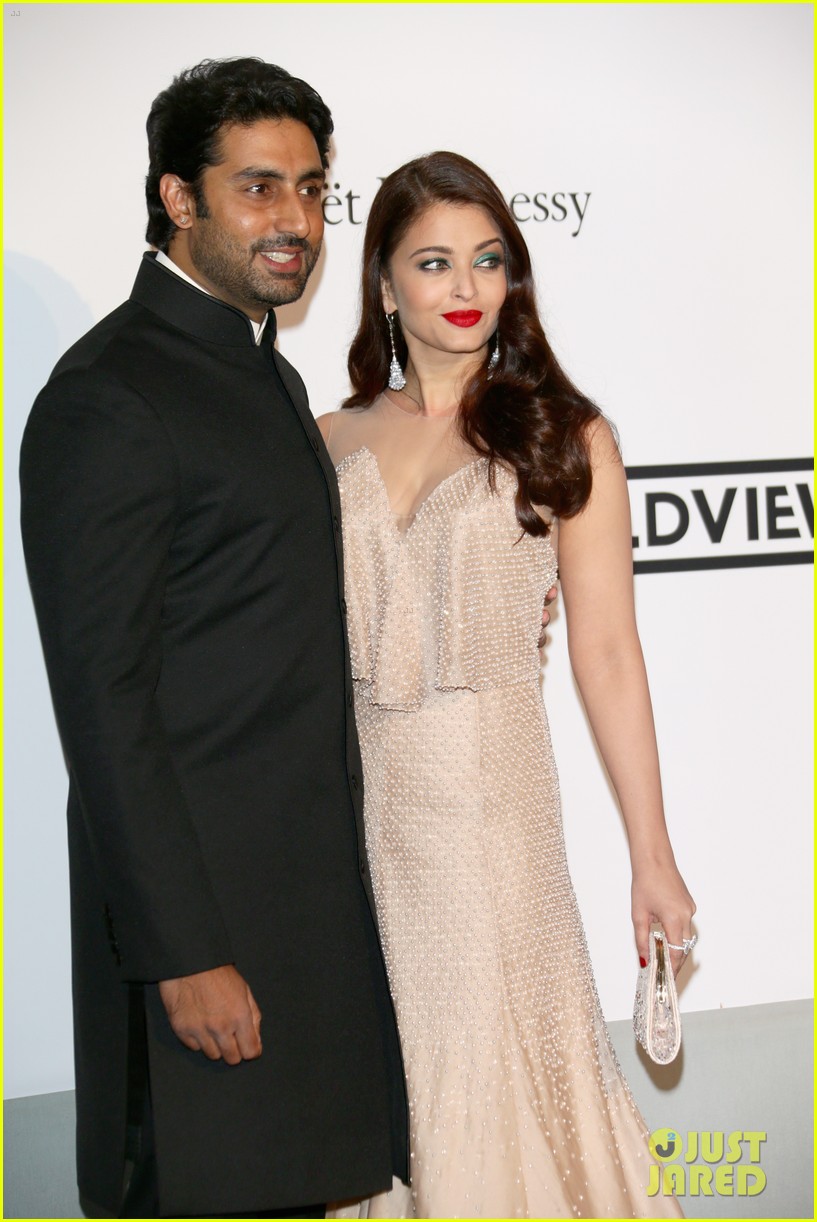 Aishwarya Rai & Husband Abishek Bachchan Share Sweet Glance at Cannes amfAR Gala 2014
