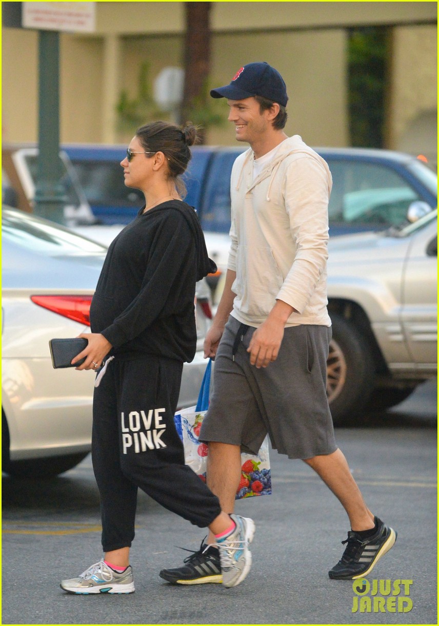 Mila Kunis Shows Off Growing Baby Bump on a Grocery Run with Ashton Kutcher!