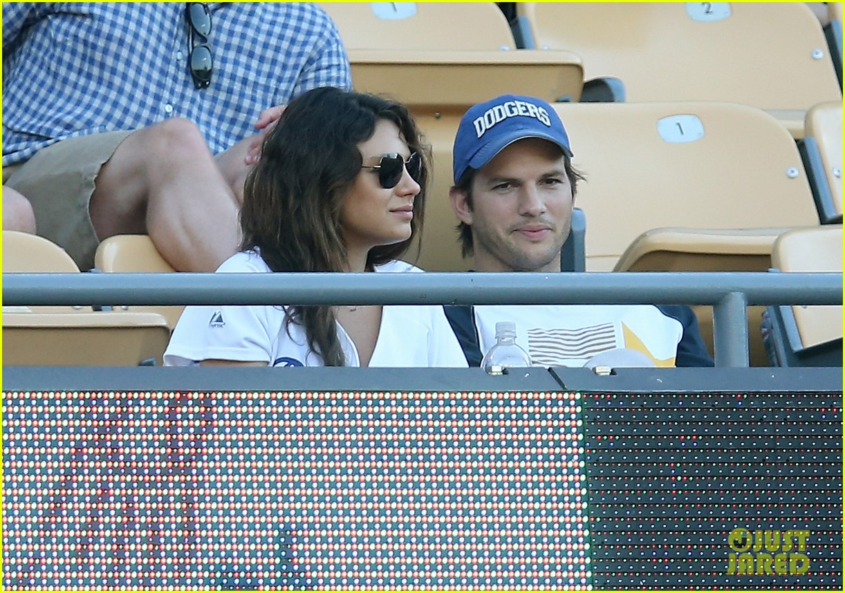 Pregnant Mila Kunis Flaunts Growing Baby Bump in Tight Tank!