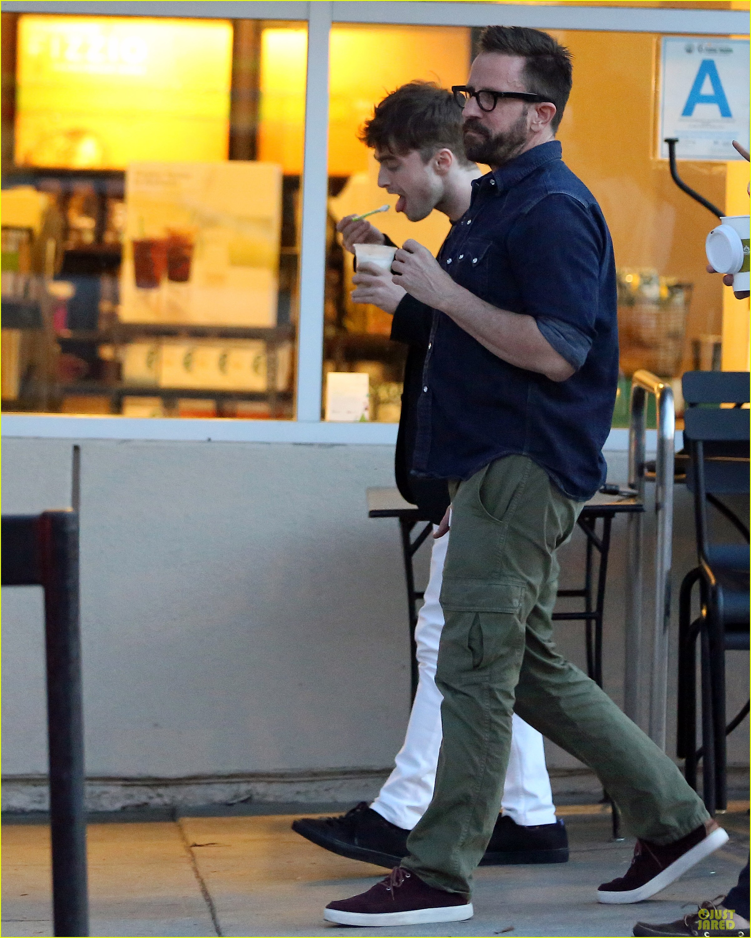 Watch Daniel Radcliffe Cut a Stranger's Hair on the Street! (Video)