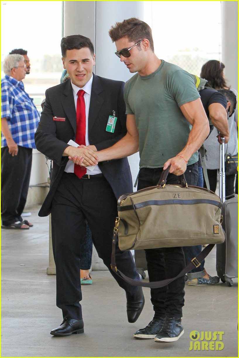 Zac Efron's Muscles Can't Be Ignored at LAX Airport