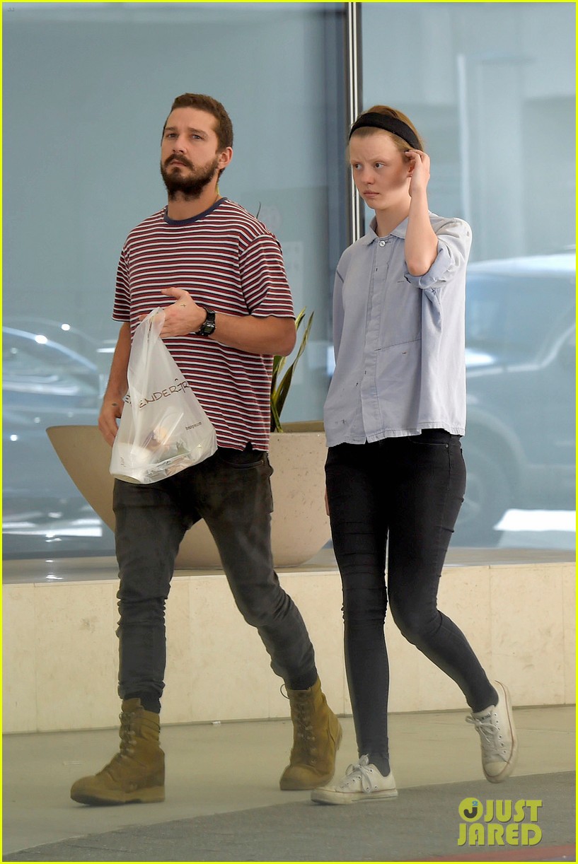 Shia LaBeouf & Mia Goth Horse Around on an Escalator