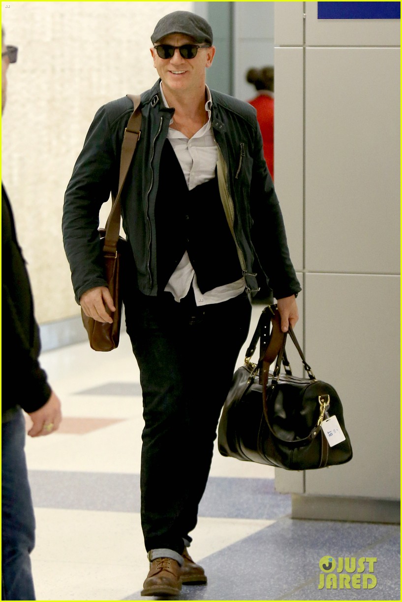 Daniel Craig Flashes a Big Smile After Arriving in New York
