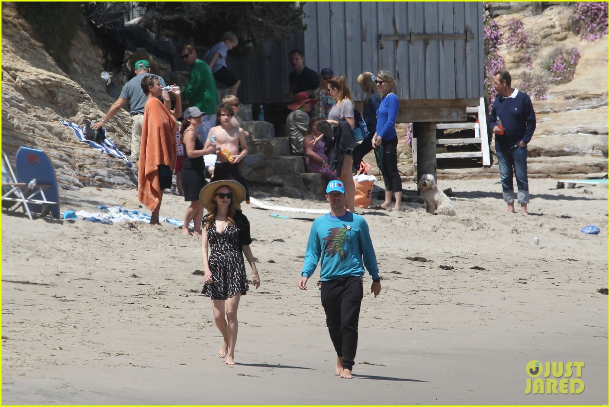 Chris Martin Goes for Malibu Beach Stroll with Heather Graham