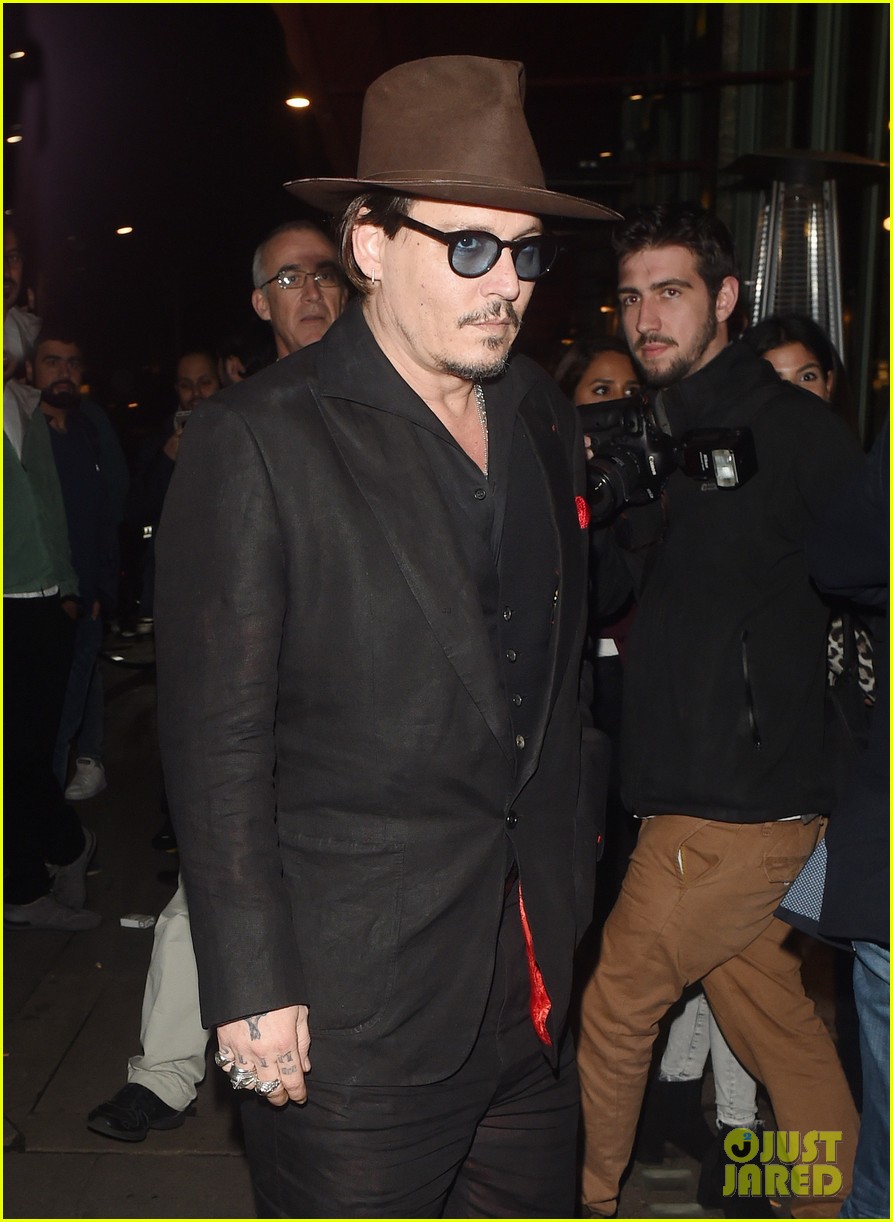 Johnny Depp Surprises Fans as the Mad Hatter at Disneyland