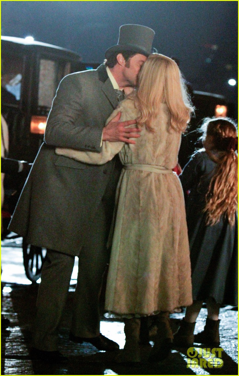 Hugh Jackman & Michelle Williams Share a Kiss on 'The Greatest Showman' Set