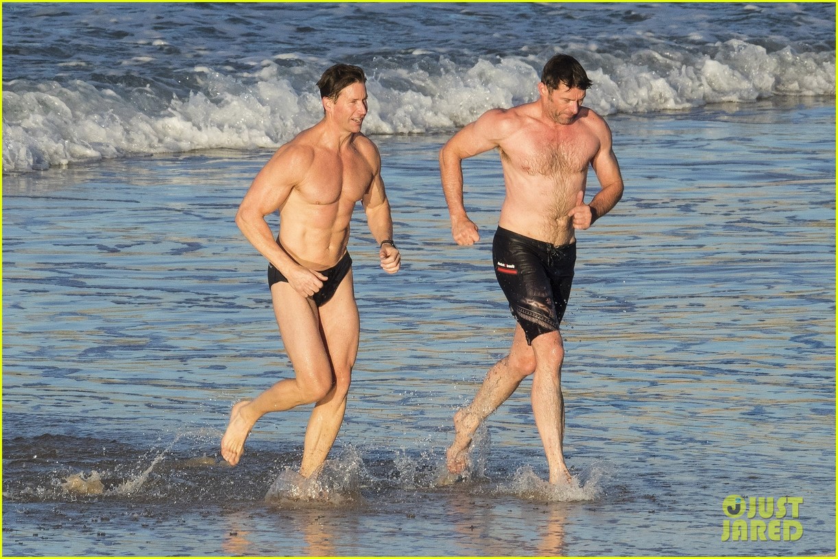 Hugh Jackman Hits the Beach with His Speedo-Clad Trainer!