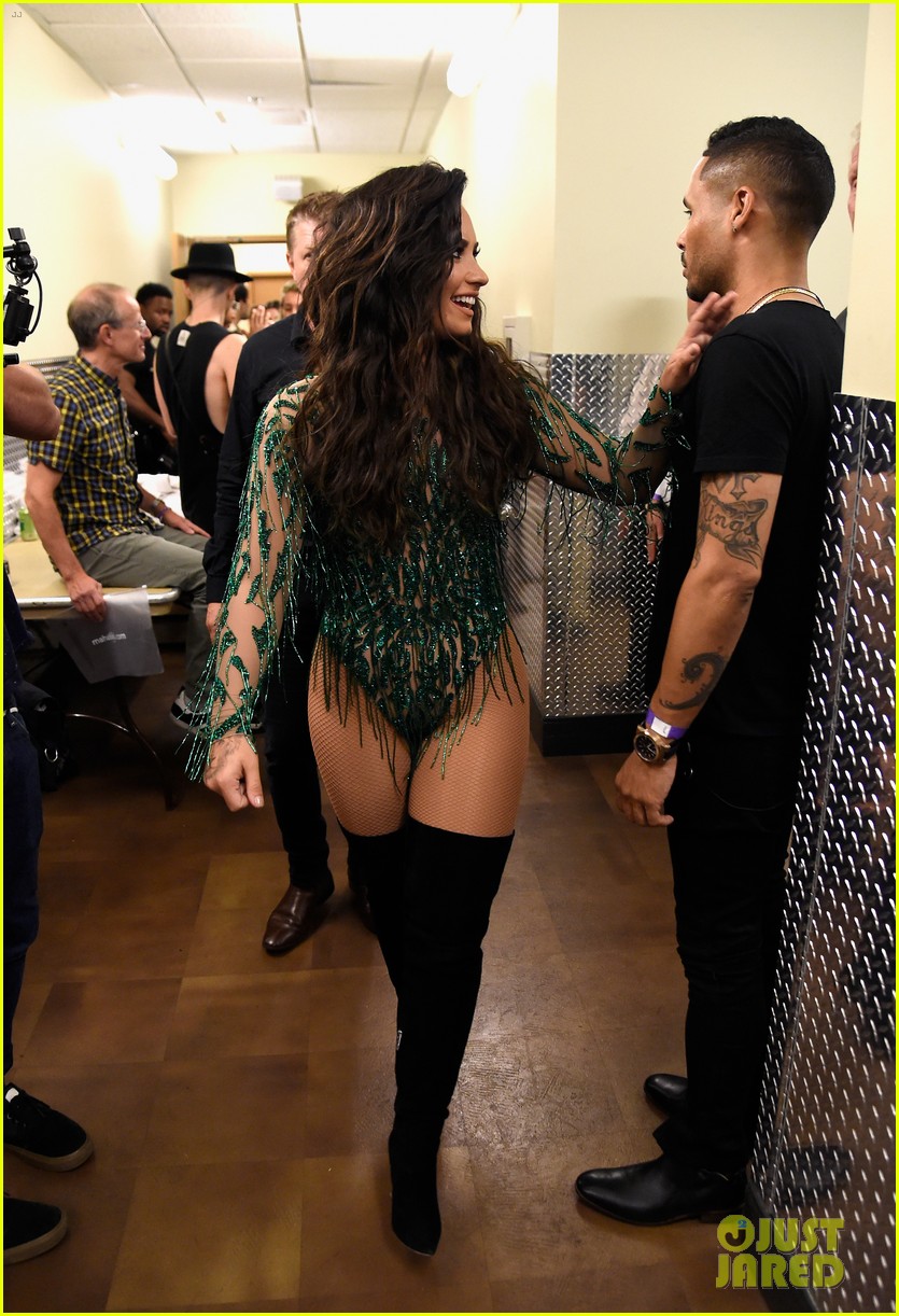 Demi Lovato Rocks Green Bodysuit for Performance in Vegas!