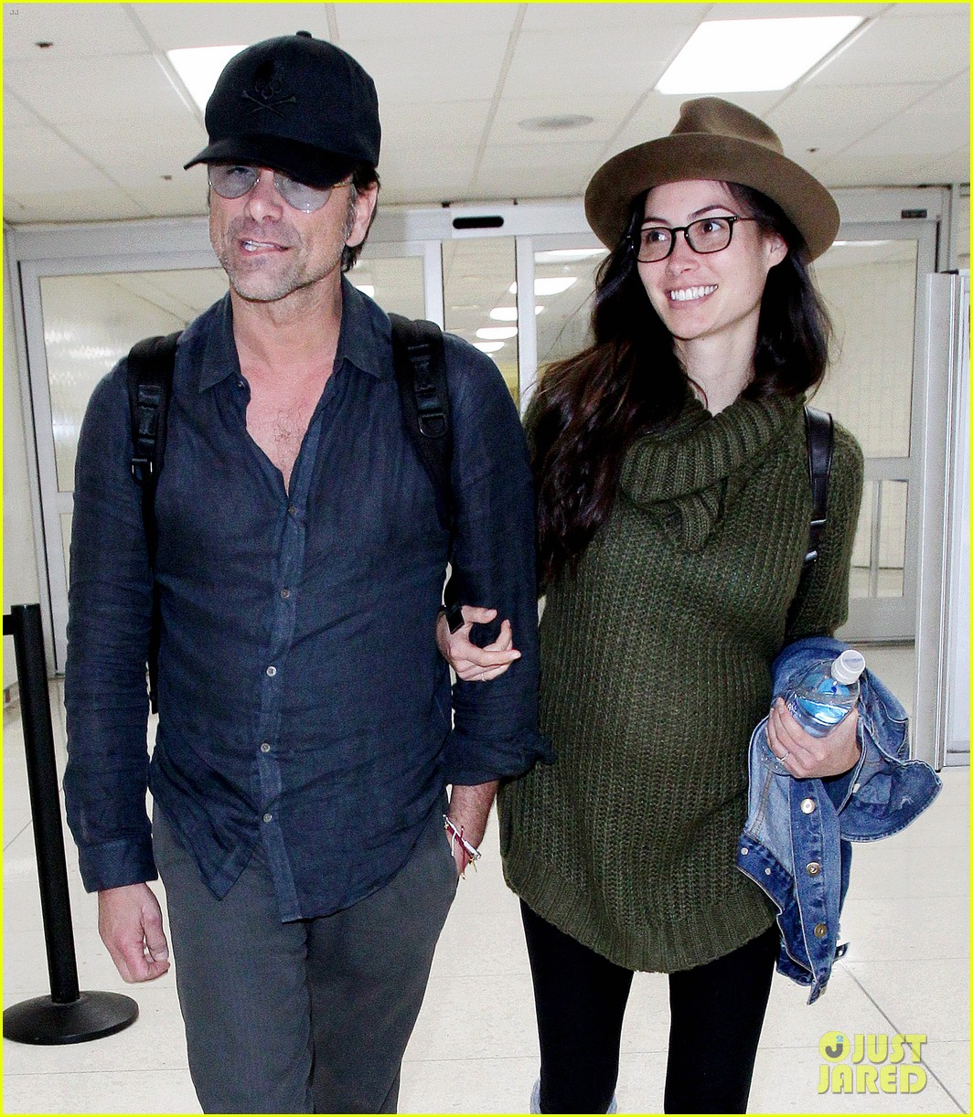 John Stamos & Pregnant Fiancee Caitlin McHugh Are All Smiles at LAX!