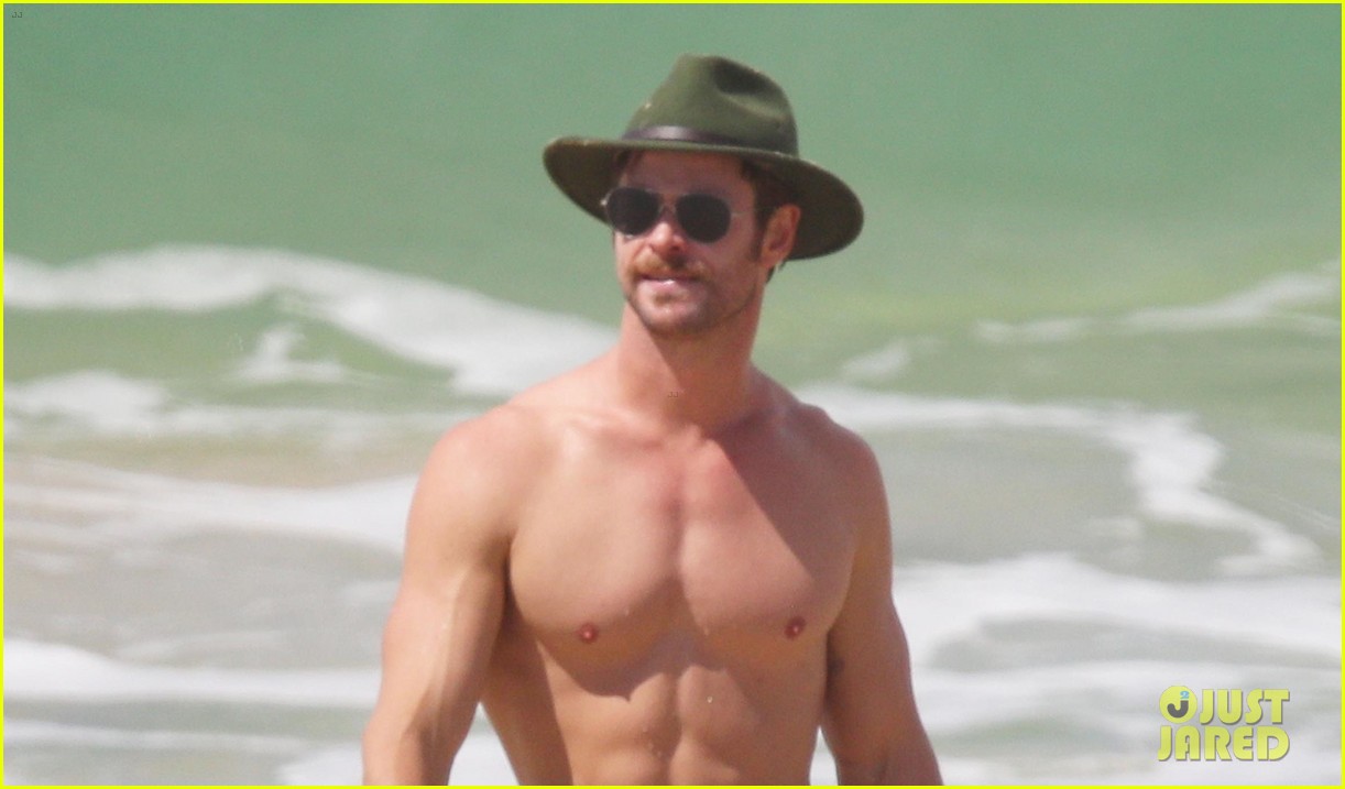 Chris Hemsworth Puts His Ripped Shirtless Body on Display as He Soaks Up the Sunshine!