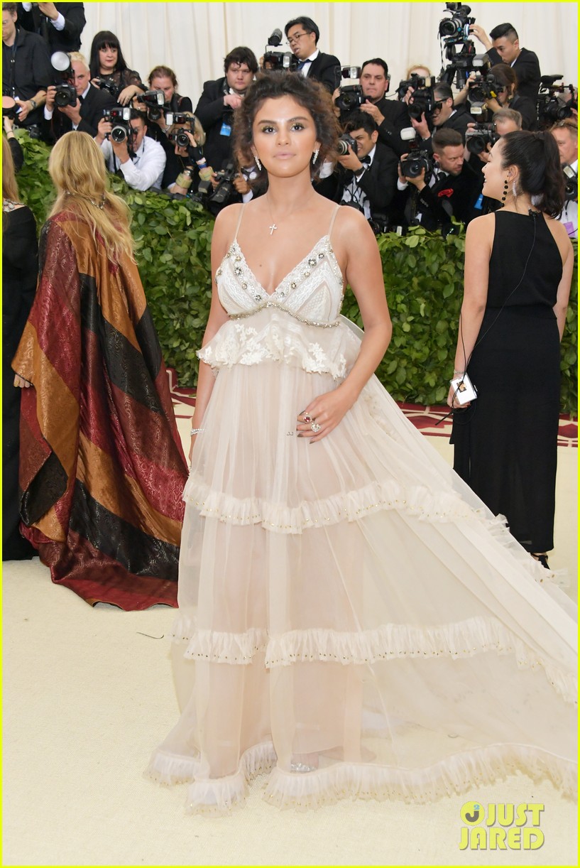 selena gomez sheer dress Selena Gomez looked chic in a sheer top with her business chic outfit on Monday in New York City. More photos on JustJared.com! #SelenaGomez Photos: Getty