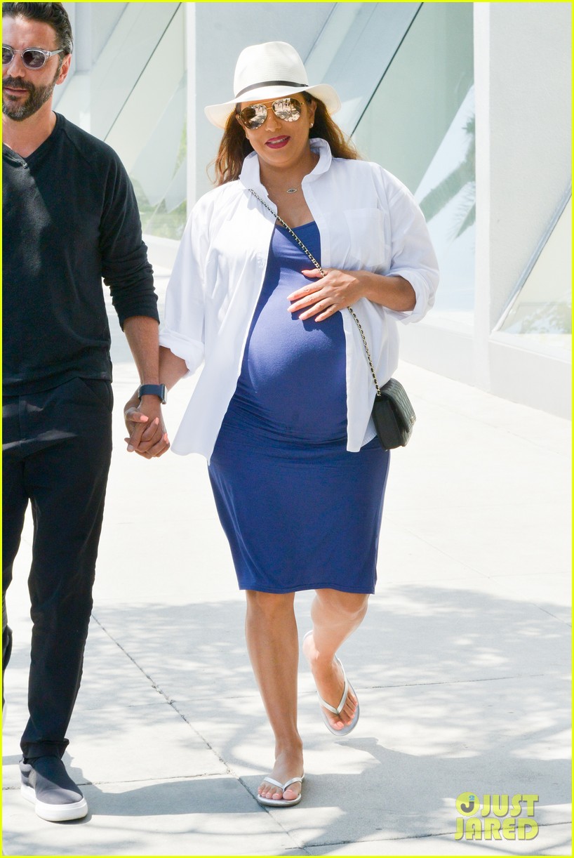 Eva Longoria Cradles Baby Bump While Out with Jose Baston!