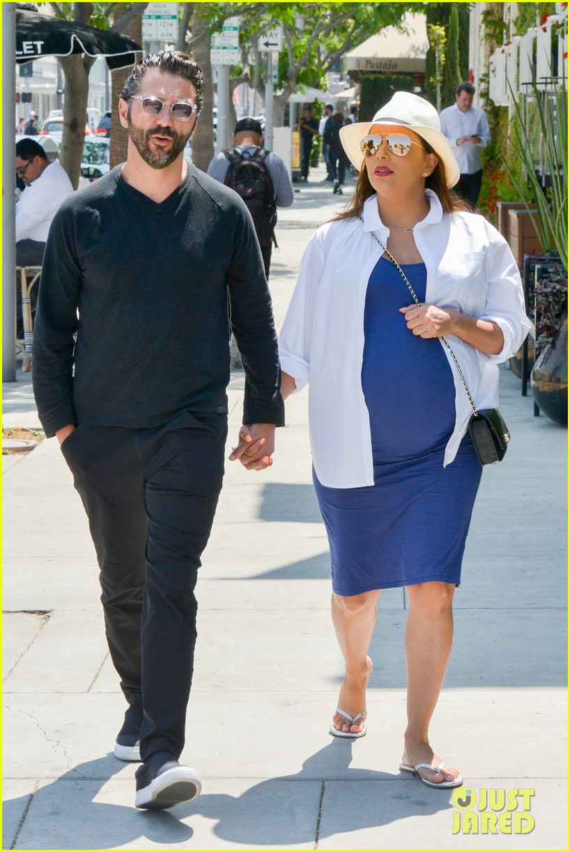 Eva Longoria Cradles Baby Bump While Out with Jose Baston!