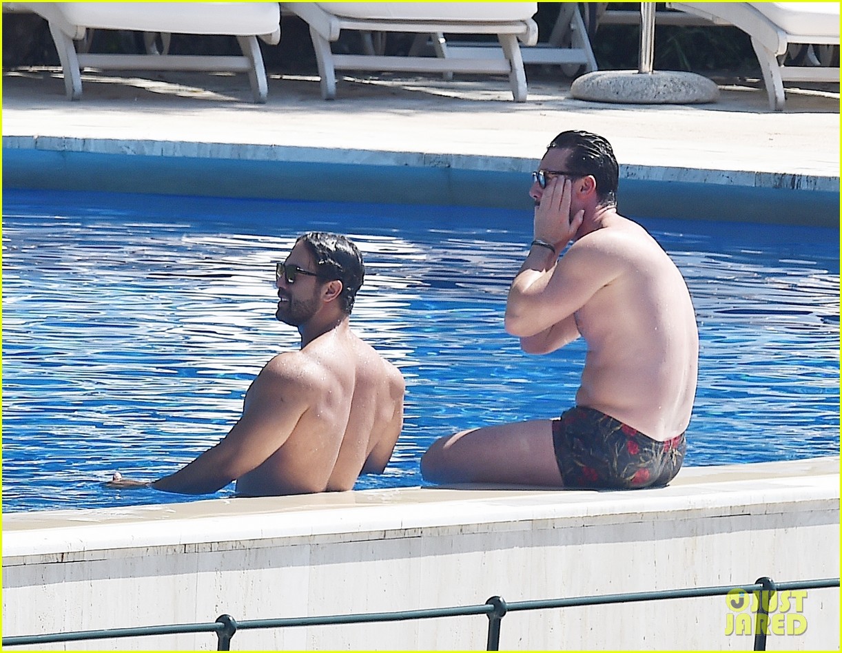 Luke Evans Shows Off His Shirtless Body In the Pool with Victor Turpin