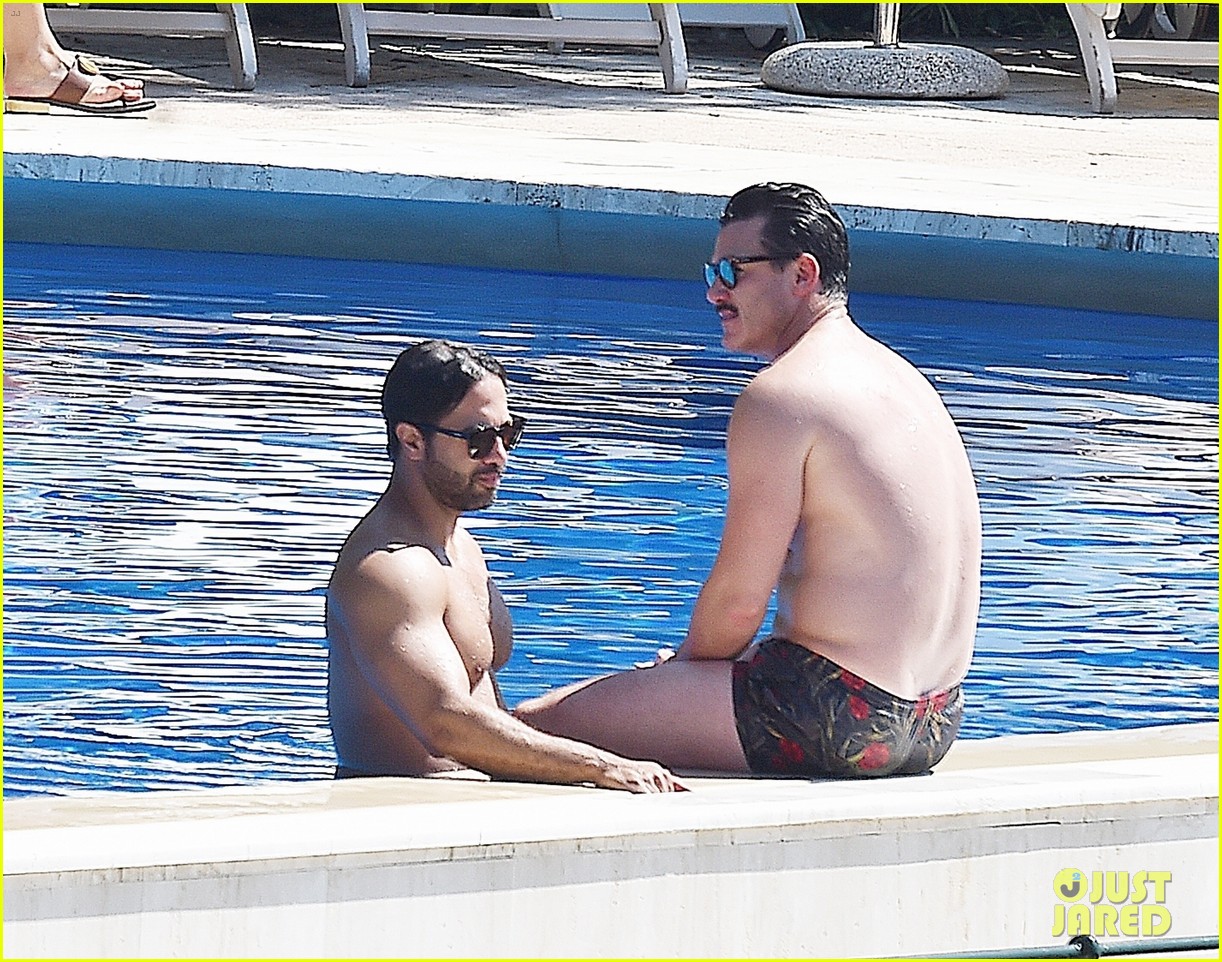 Luke Evans Shows Off His Shirtless Body In the Pool with Victor Turpin