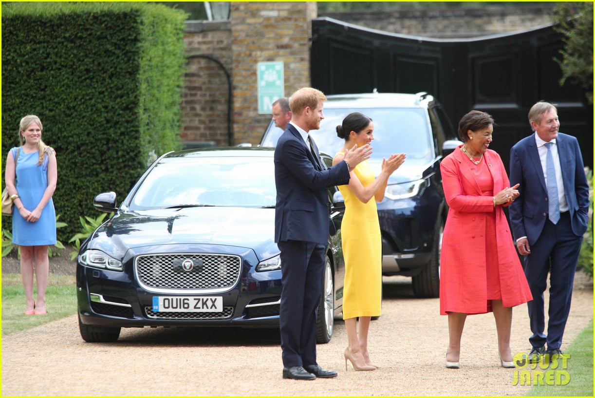 Duchess Meghan Markle & Prince Harry Are Picture Perfect at Commonwealth Youth Challenge Reception