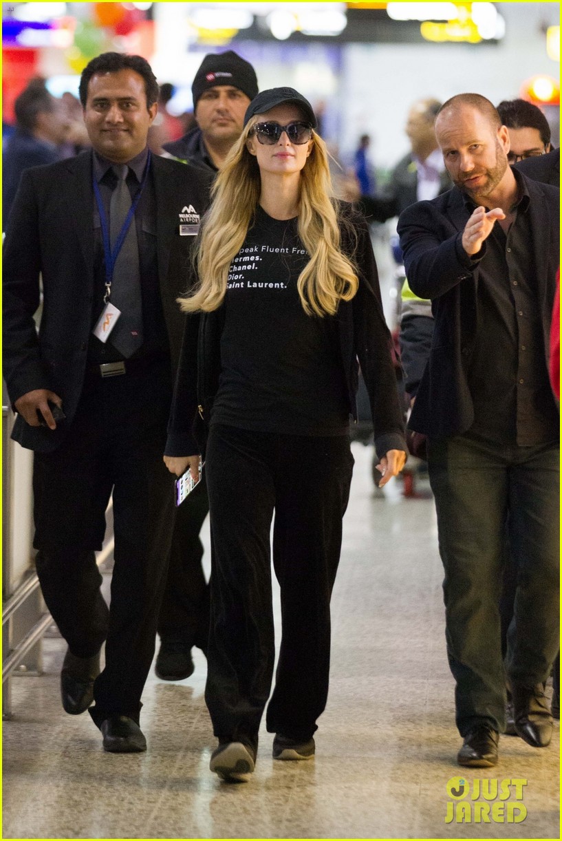 Paris Hilton Looks Happy Arriving in Melbourne Without Engagement Ring Following Split With Chris Zylka