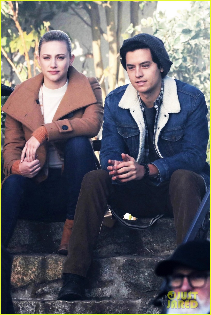 Lili Reinhart & Cole Sprouse Share A Laugh Between Filming New 'Riverdale' Scenes