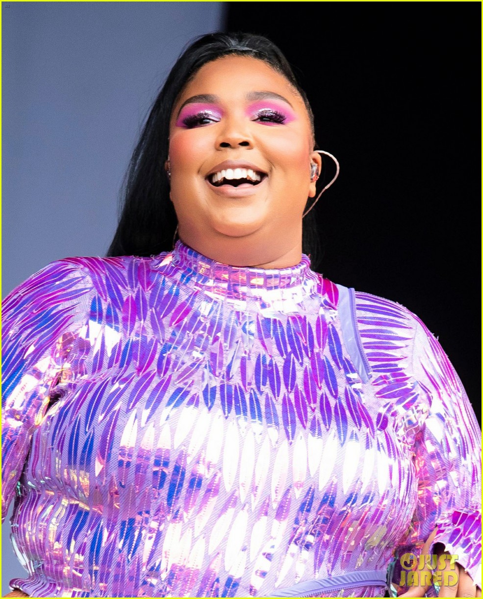 lizzo purple dress Lizzo dazzles in completely sheer dress at Cardi B's party