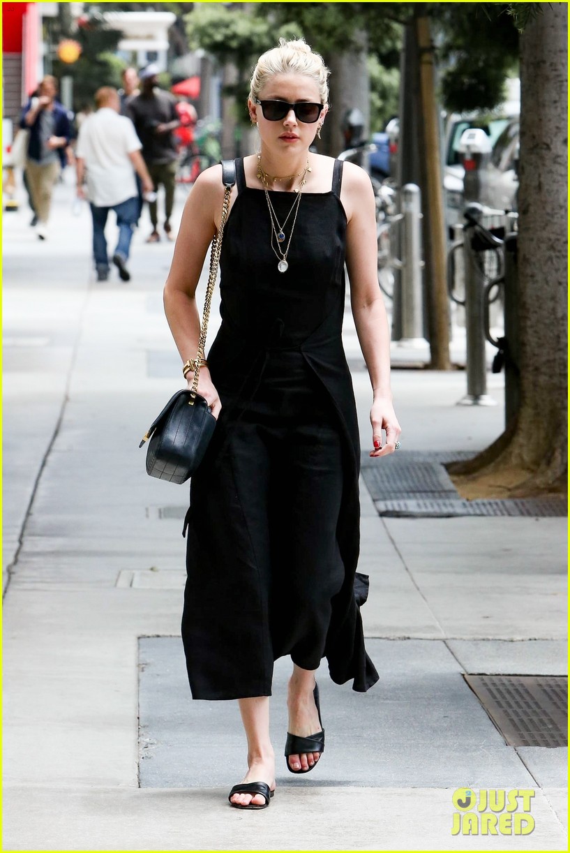 Amber Heard Looks Chic in Black Dress for Santa Monica Stroll