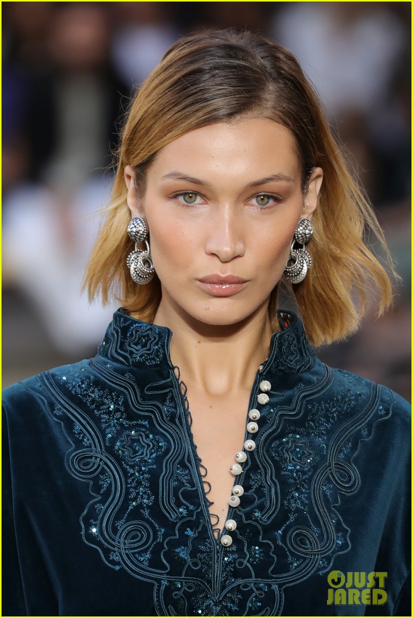 bella hadid blue mini dress Bella Hadid steals the show in a blue mini-dress and shiny boots at Paris Fashion Week