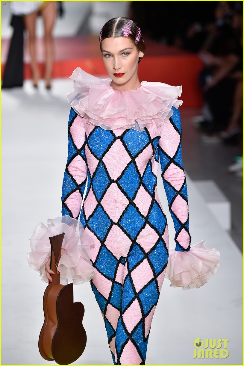 Bella Hadid & Kaia Gerber Wear Musical Outfits for Moschino's Milan Show!