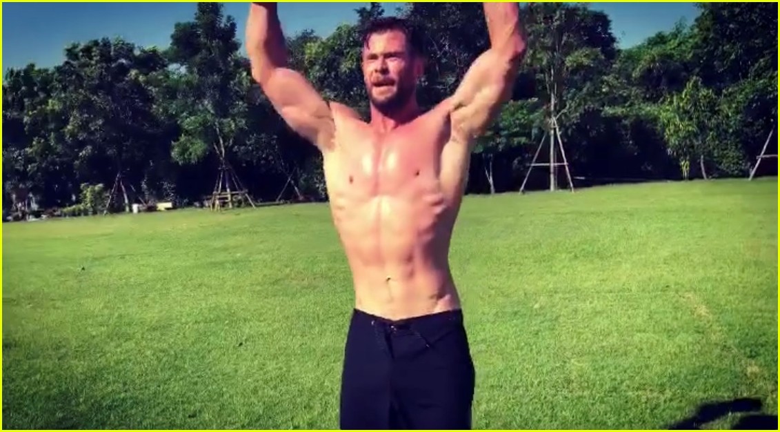 Chris Hemsworth Goes Shirtless After His Shirt 'Burst Into Flames' from the Heat (Video)