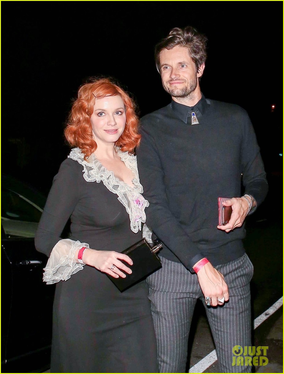 Christina Hendricks Gets Festive with a Friend at Jennifer Klein's Holiday Party!