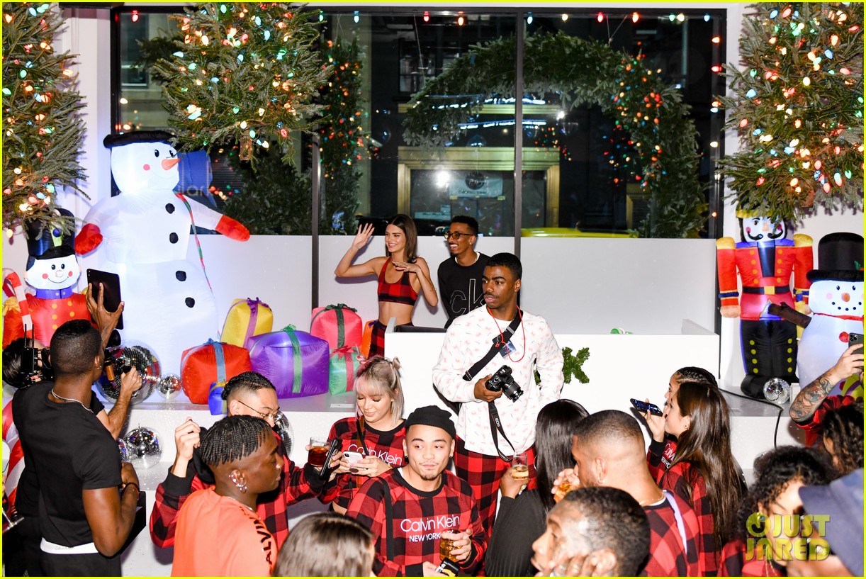 Kendall Jenner Wears Buffalo Checked Look For Calvin Klein's Holiday Pajama Party