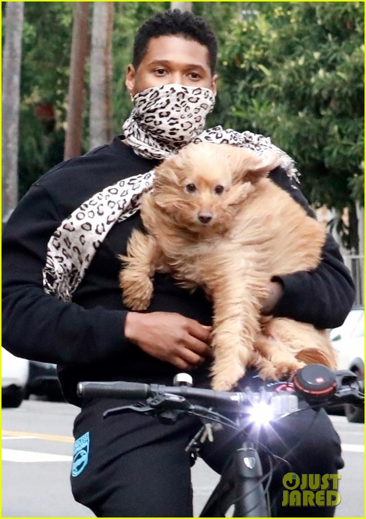 Usher Carries His Dog on Bike Ride with Girlfriend Jennifer Goicoechea