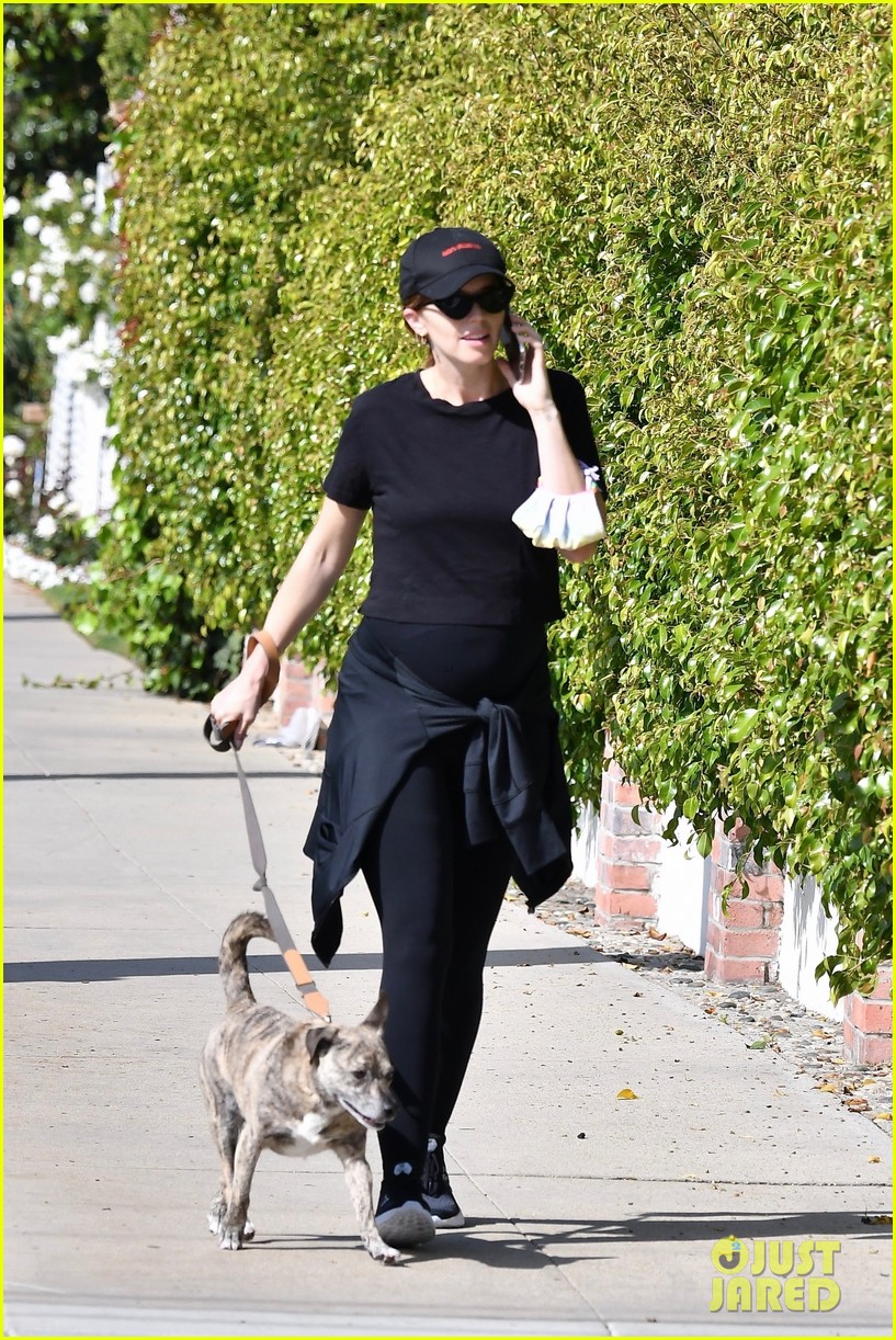 Pregnant Katherine Schwarzenegger Shows Off Tiny Baby Bump While Walking Her Dog
