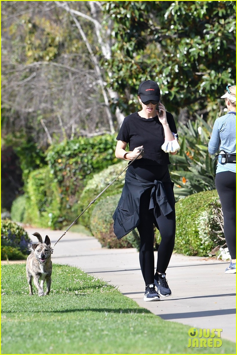 Pregnant Katherine Schwarzenegger Shows Off Tiny Baby Bump While Walking Her Dog