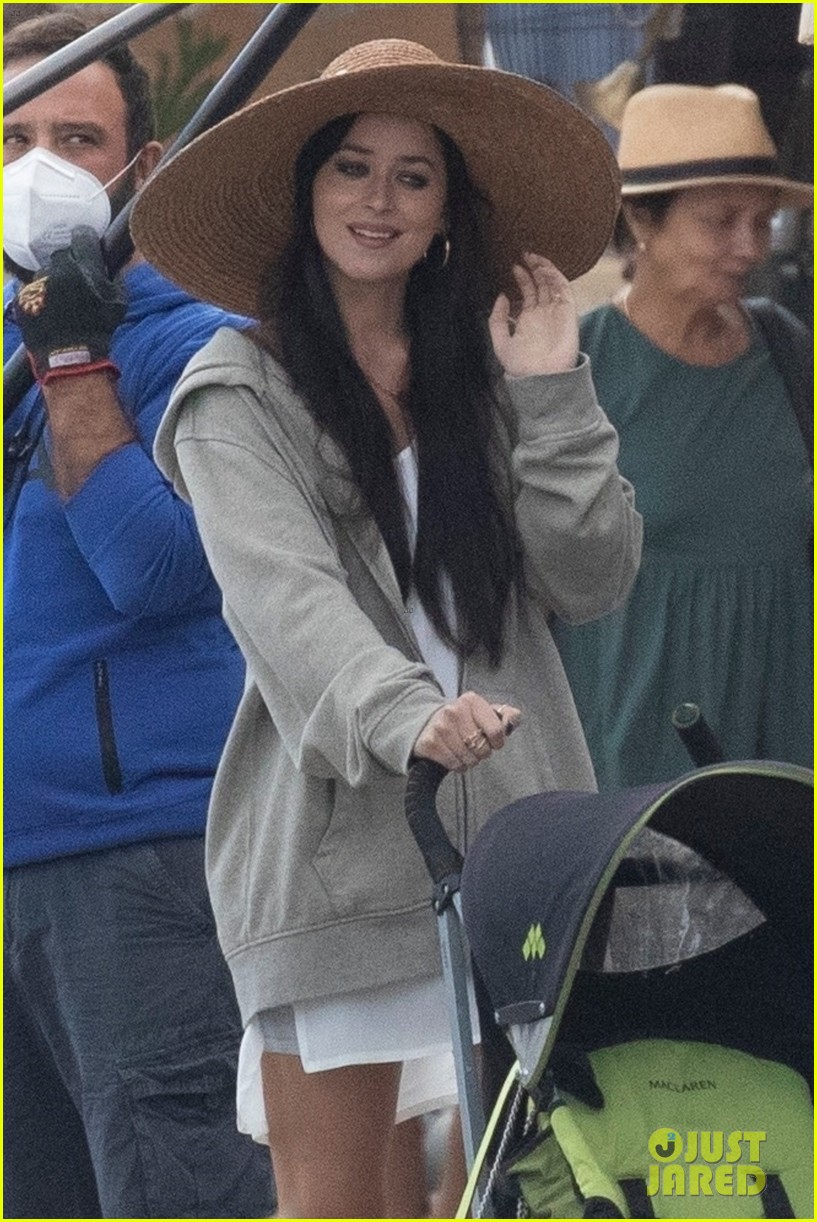 Dakota Johnson Is a Doting Mom in New Set Photos from 'The Lost Daughter'