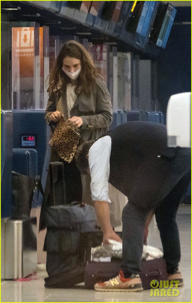Lily James & Dominic West Cuddle at Airport After PDA Pics (Photos)