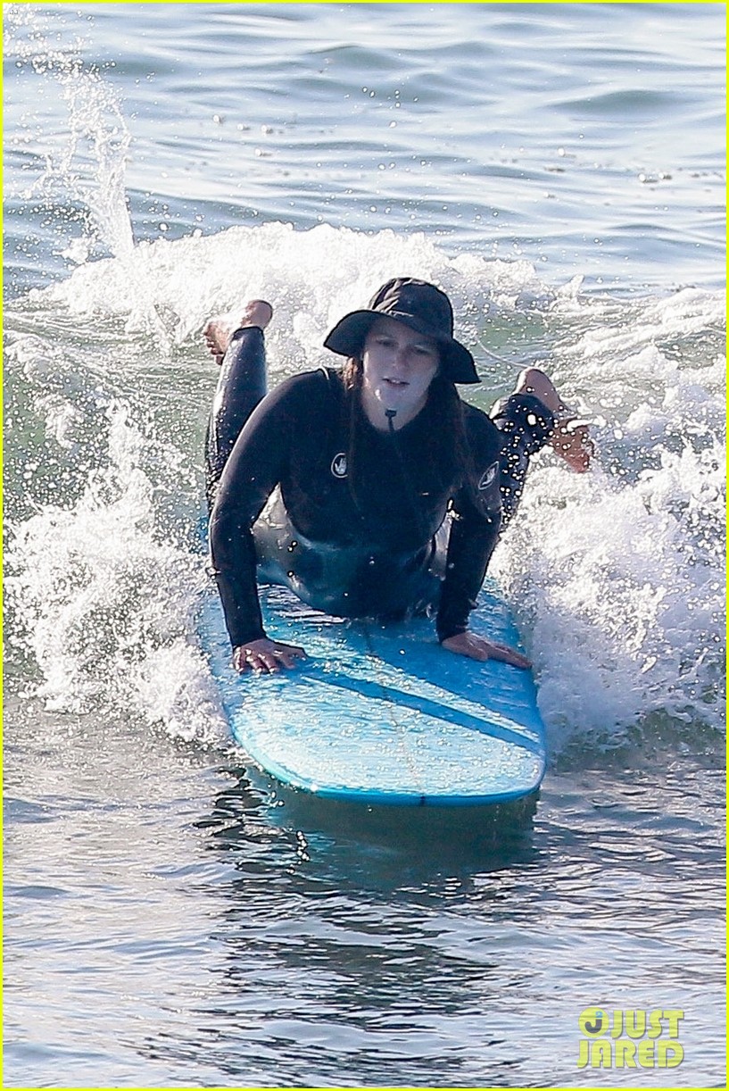 Leighton Meester & Adam Brody Adorably Hold Hands While Riding Their Surfboards in the Ocean