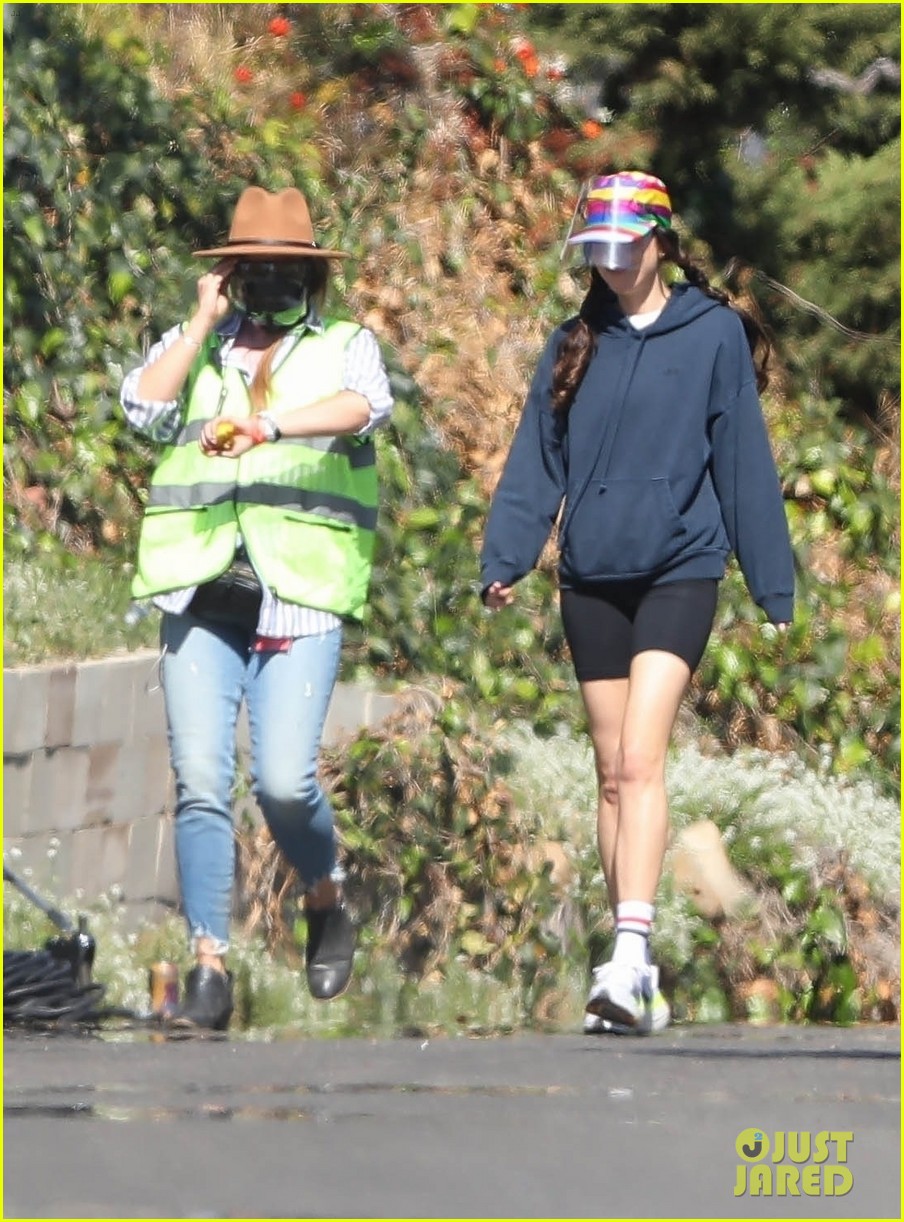 Dakota Johnson Sports Rainbow Hat & Biker Shorts on Set of 'Am I Ok?'