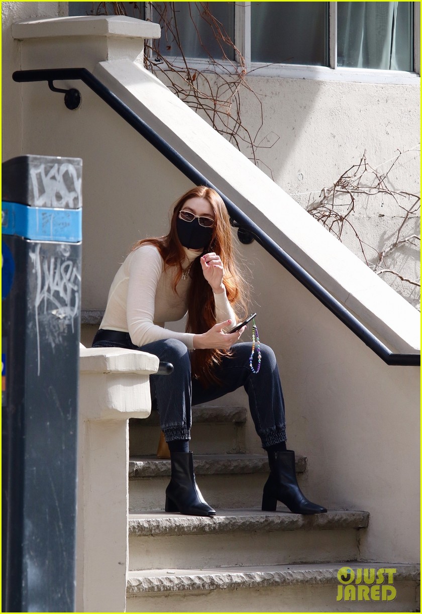 Model Gigi Hadid Chills Out on Stoop After Business Meeting