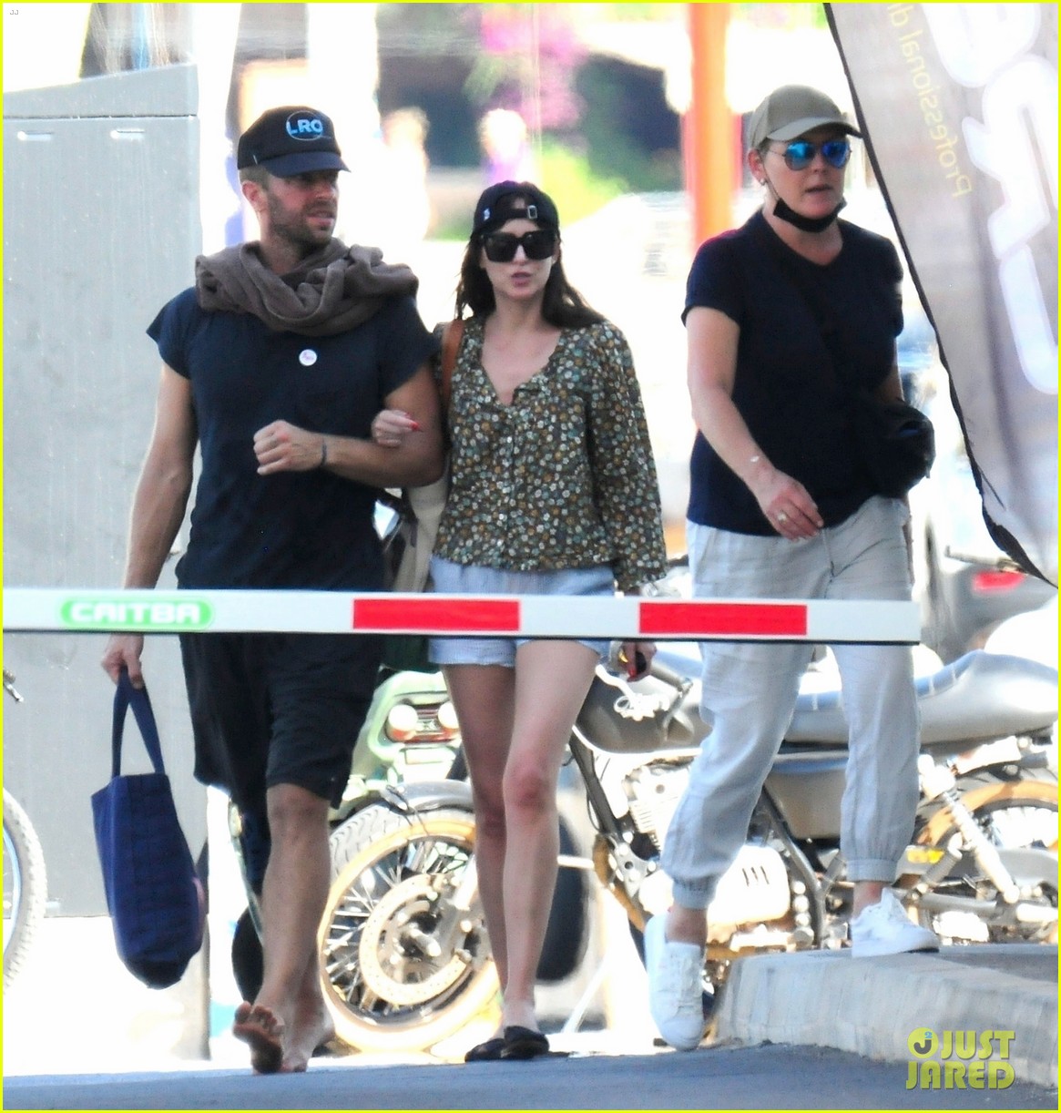 Dakota Johnson & Chris Martin Spotted Together on Vacation in Spain! (New Photos)