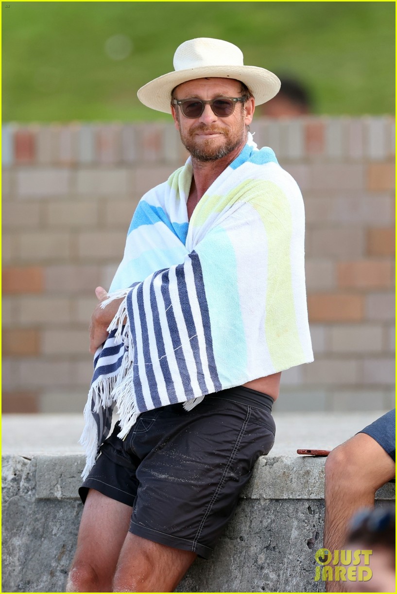 Simon Baker Goes Shirtless During Beach Day with 22-Year-Old Son Claude - See Photos!