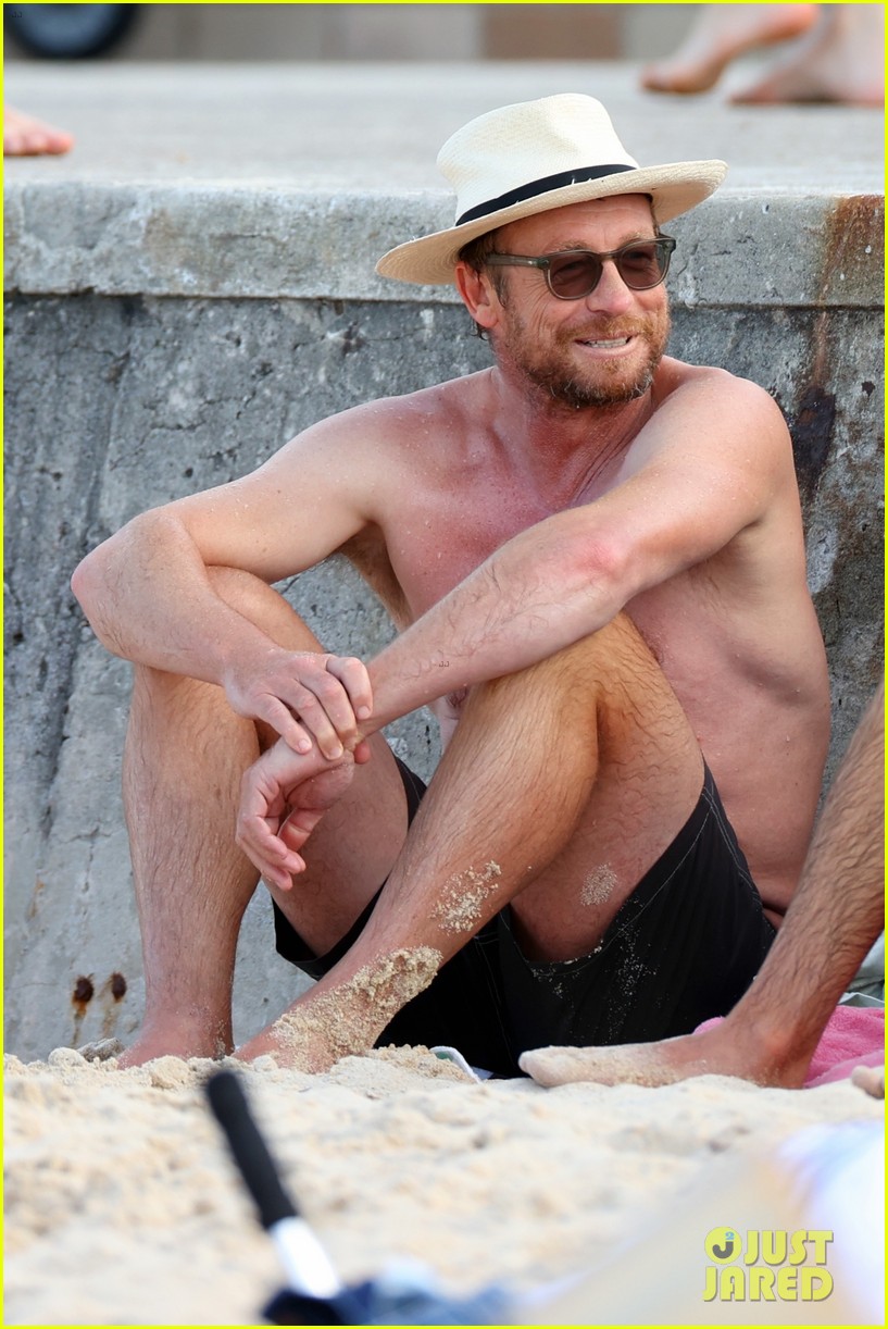 Simon Baker Goes Shirtless During Beach Day with 22-Year-Old Son Claude - See Photos!