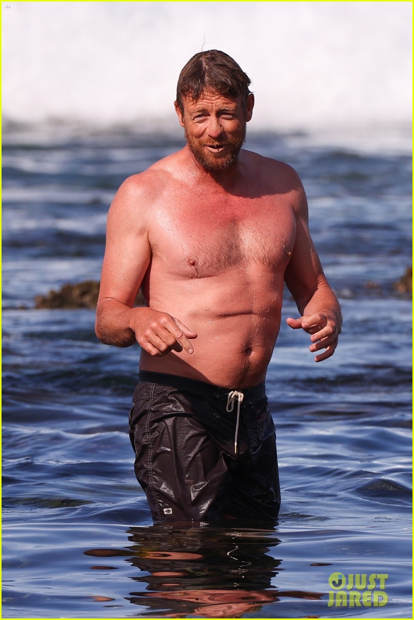 Simon Baker Goes Shirtless During Beach Day with 22-Year-Old Son Claude - See Photos!