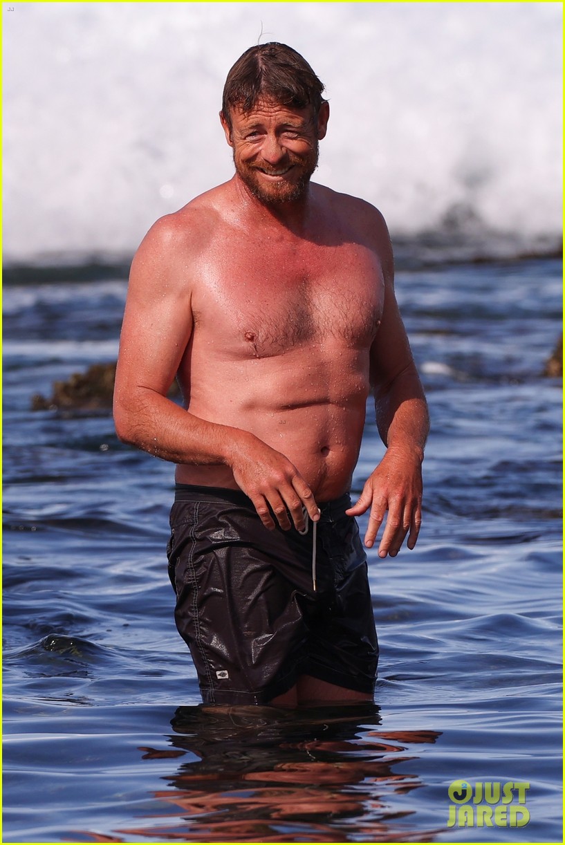 Simon Baker Goes Shirtless During Beach Day with 22-Year-Old Son Claude - See Photos!