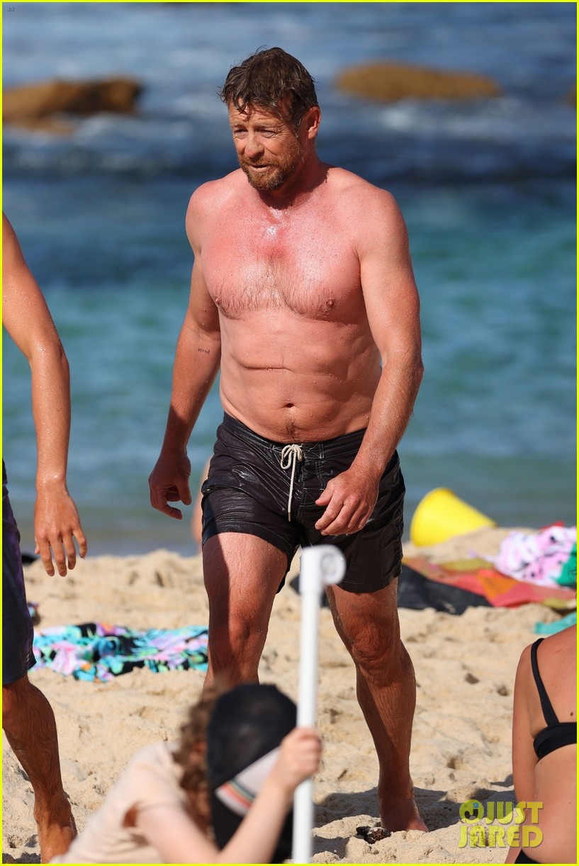 Simon Baker Goes Shirtless During Beach Day with 22-Year-Old Son Claude - See Photos!