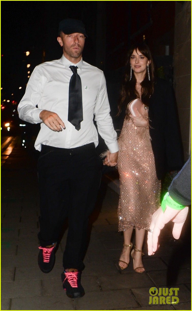 Dakota Johnson & Chris Martin Hold Hands in Rare Photos Together